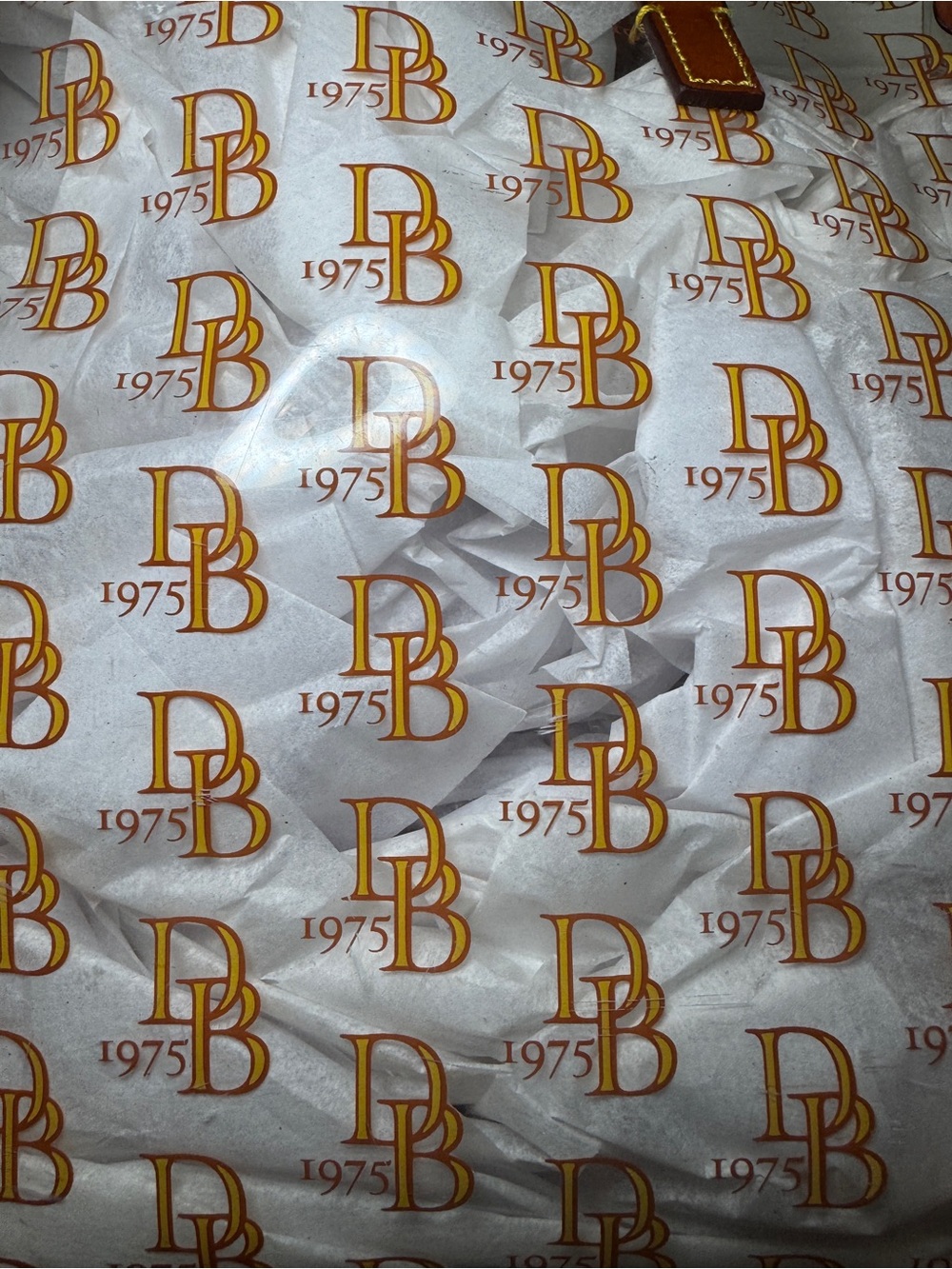 Dooney & Bourke White Tote with Brown Leather Handles and Gold Logo Print - Picture 5 of 5